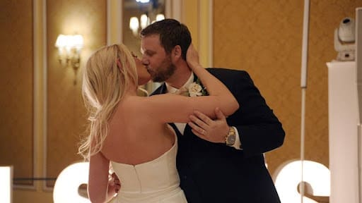 Bride and groom first kiss at The Broadmoor wedding ceremony in Denver