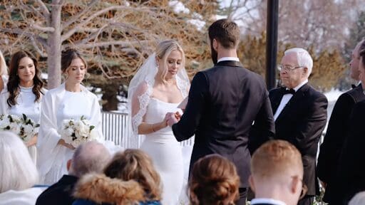 Bride and groom sharing emotional vows during wedding ceremony